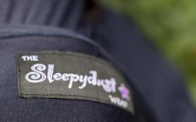 close up of Midnight Bliss with a black label containing the Sleepydust logo